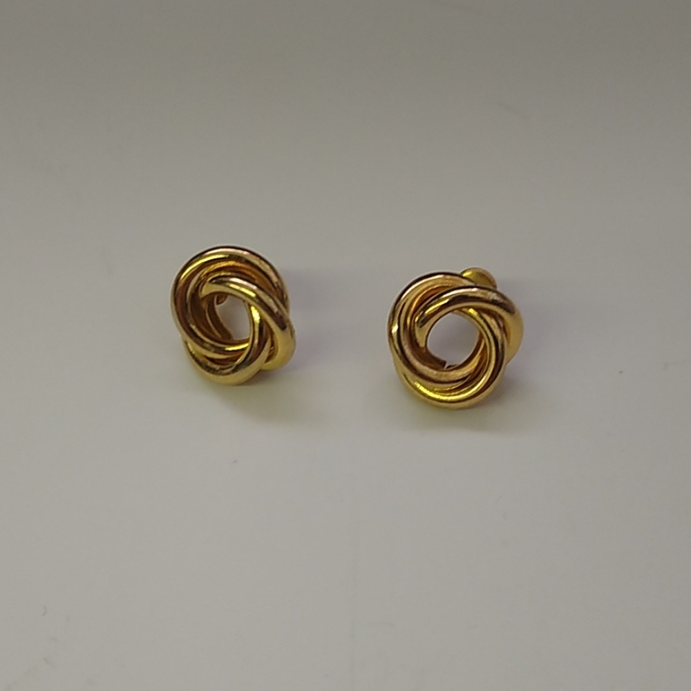 Goldtone knot shaped earrings.